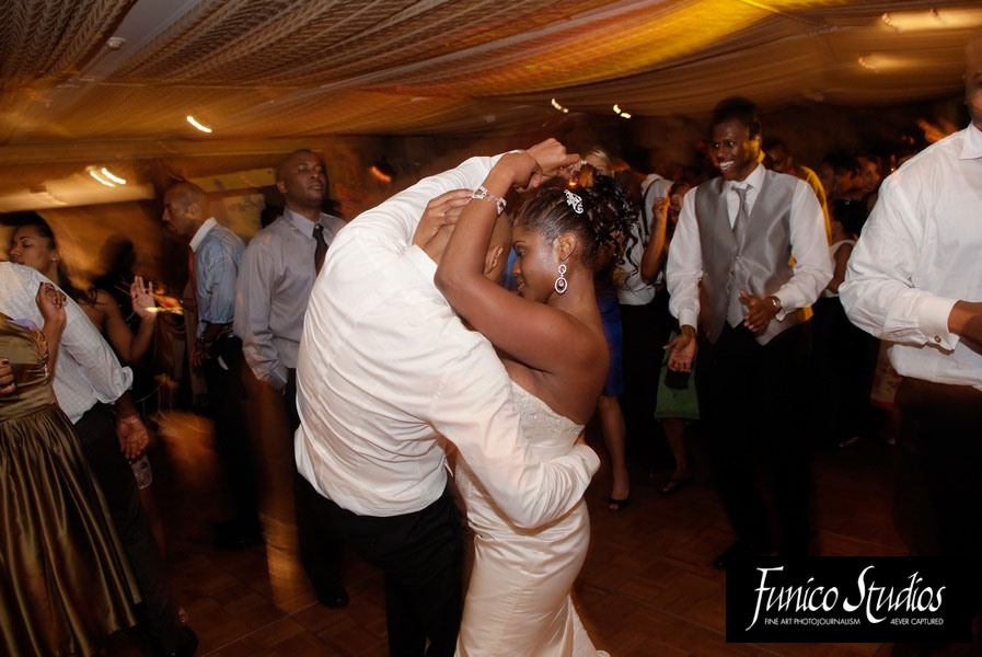 bride and groom dancing at wedding reception
